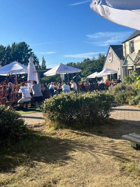 The Teal Farm beer garden packed with people on a sunny day